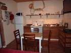 Fully equipped kitchen with authentic décor and
                    42 inch TV