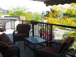Enjoy a drink or a meal on the 50 foot deck of
                  the Heritage Plaza Suite