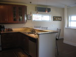 Kitchen includes pantry, dishwasher and washer dryer