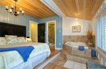  Enjoy your
                  view of the lake from your comfortable queen size bed